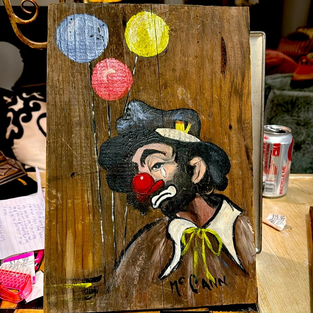 Paint on wood clown crying